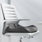Dark gray contoured seat cushion on a white office chair