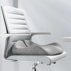 Light gray contoured seat cushion on a white office chair