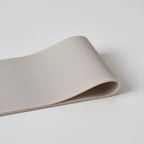 Close-up of a flat natural rubber loop band