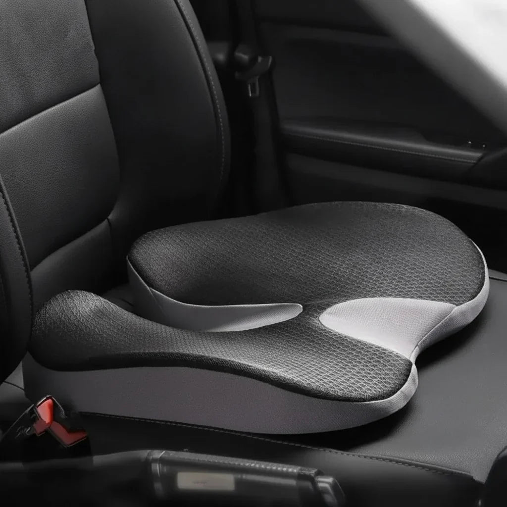 ErgoDrive inclined cushion on a black leather driver's seat