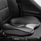 ErgoDrive inclined cushion on a black leather driver's seat