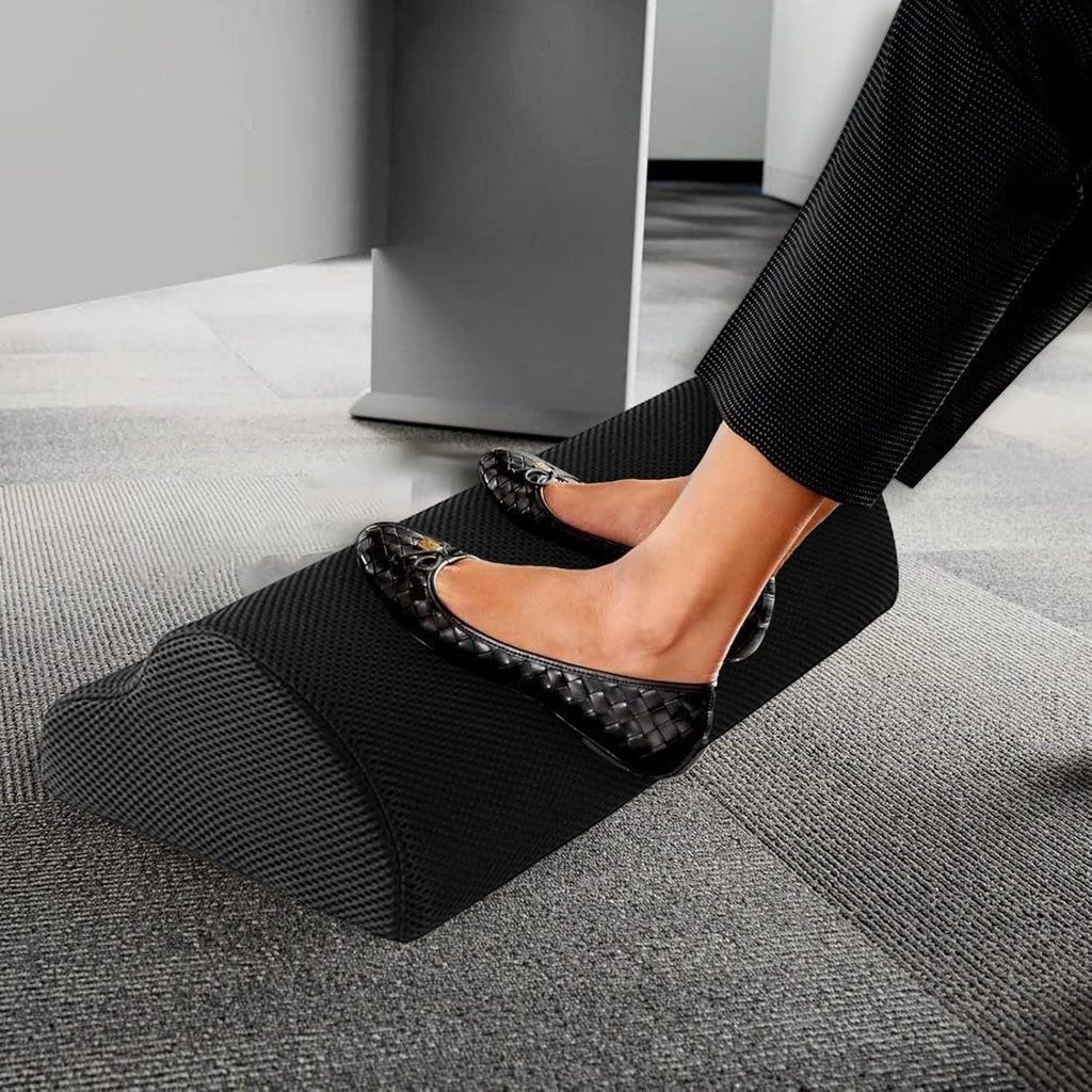 CUSHEAL ErgoSoft black footrest in use under an office desk