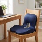 Navy ErgoWrap one-piece seat and back cushion on a wooden desk chair