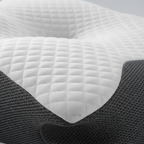 Close-up of the CerviZen quilted white top and dark gray side panel