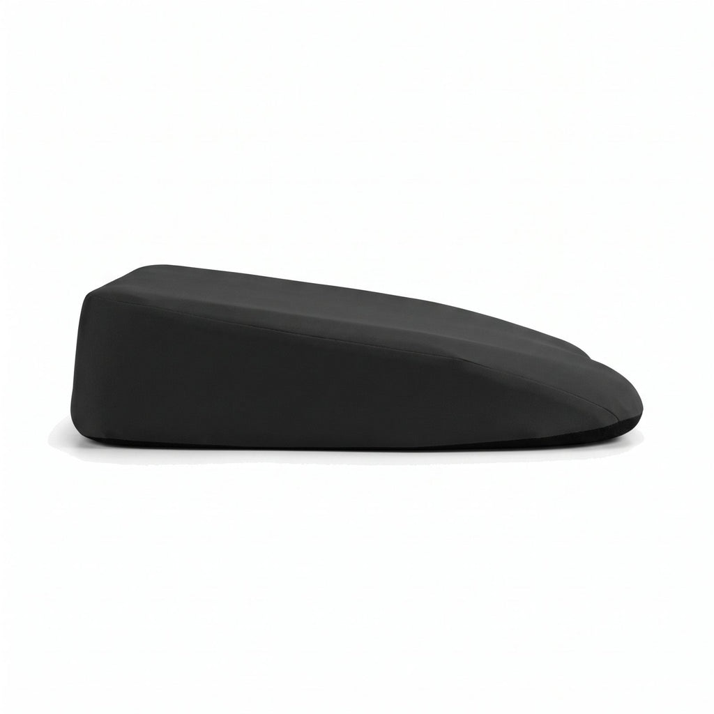 Side view of the black RideRise cushion: thick at the back, thinner at the front