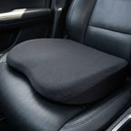Close-up of the RideRise cover and its sloped profile on a leather car seat