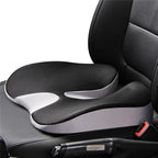 SciatiGuard seat cushion in gray (black top, light gray sides) on a car seat, U-cut toward the backrest