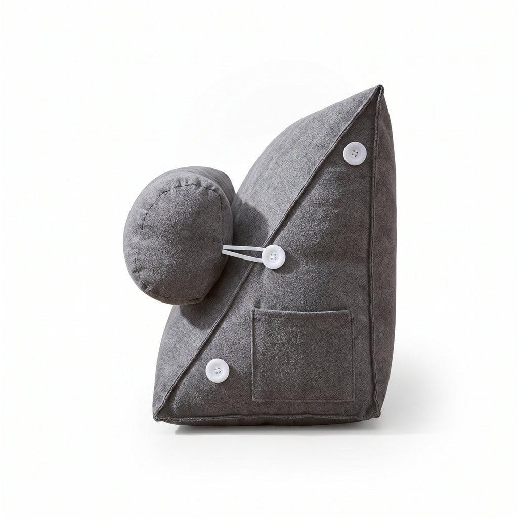 Gray WedgeRest pillow seen from the side, showing its triangular shape, bolster and side pocket